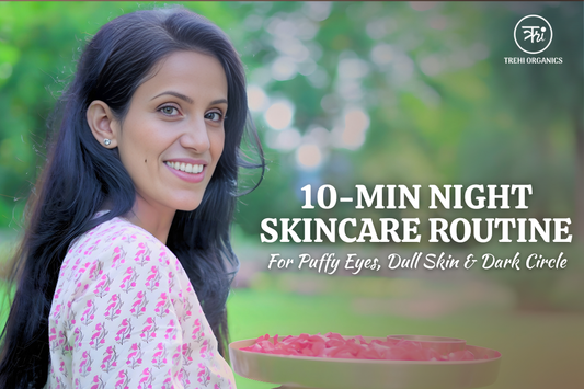 A woman gently massaging her arm as part of a calming night skincare ritual, surrounded by soft green leaves, with the text “10-Min Night Skincare Routine for Puffy Eyes, Dull Skin & Dark Circles” and Trehi Organics branding on a warm, earthy background.